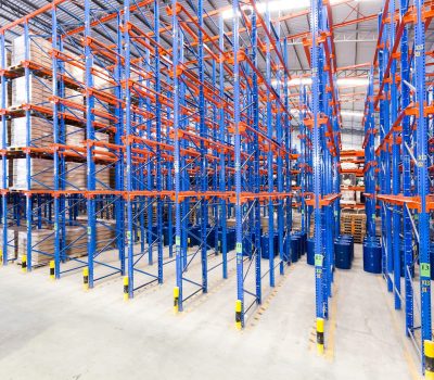 logistic, storage, shipment, industry and manufacturing concept - storing at warehouse shelves